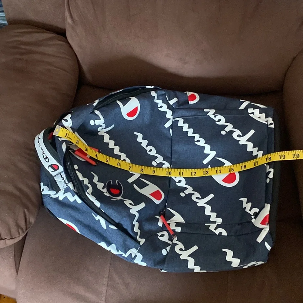 Champion blue,navy Travel Backpack,work bag, with Red Accents